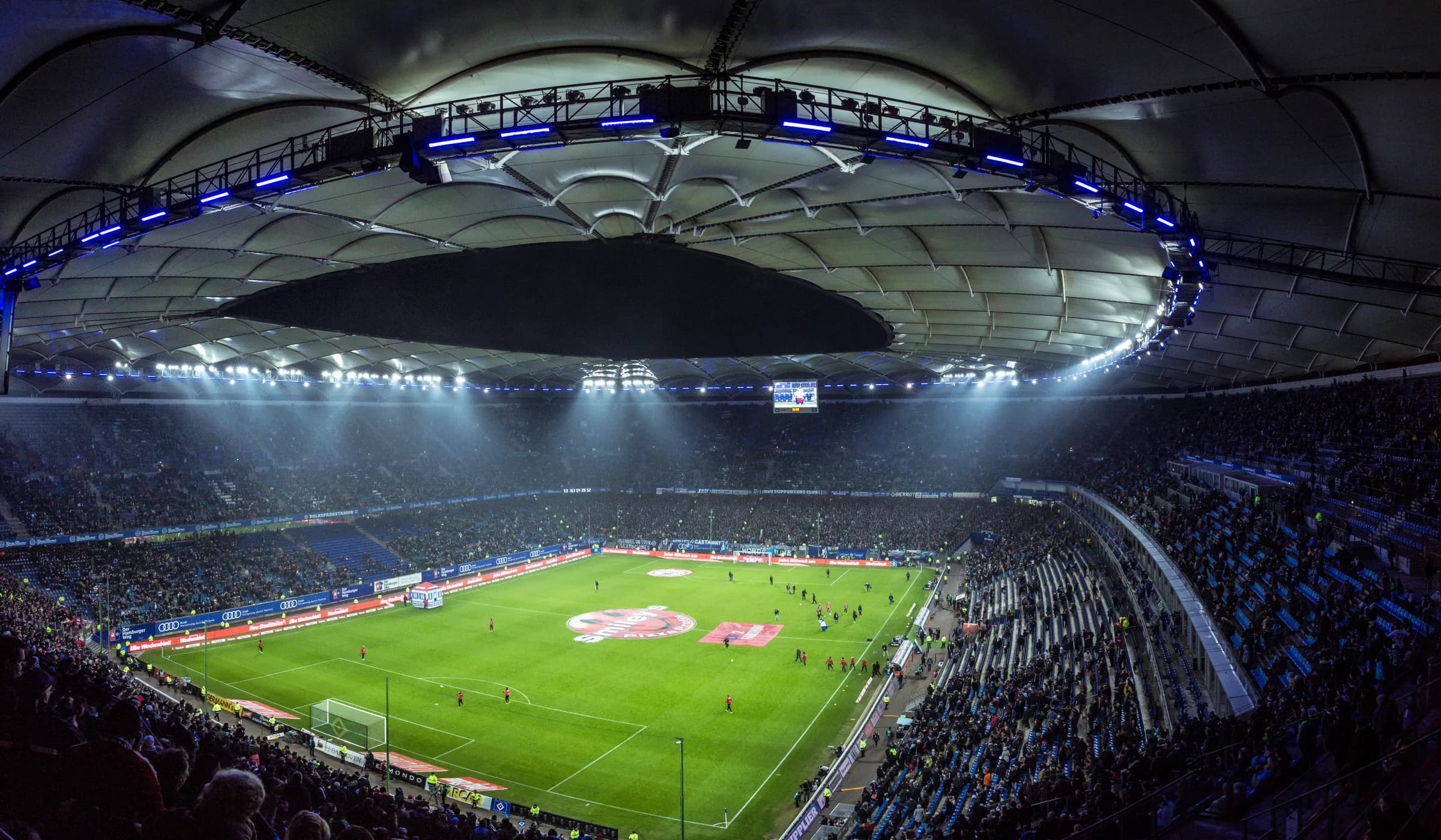 Night football stadium with floodlights